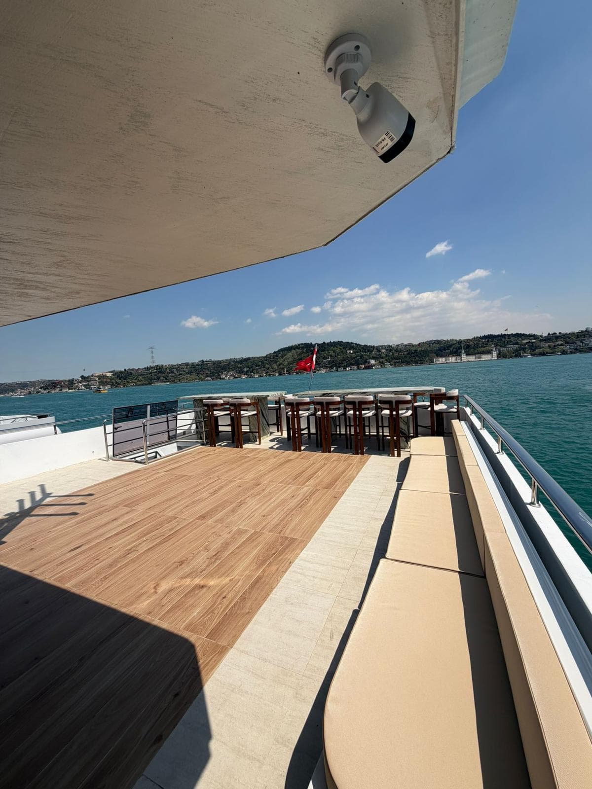 Larger event-deck yacht on the Istanbul strait