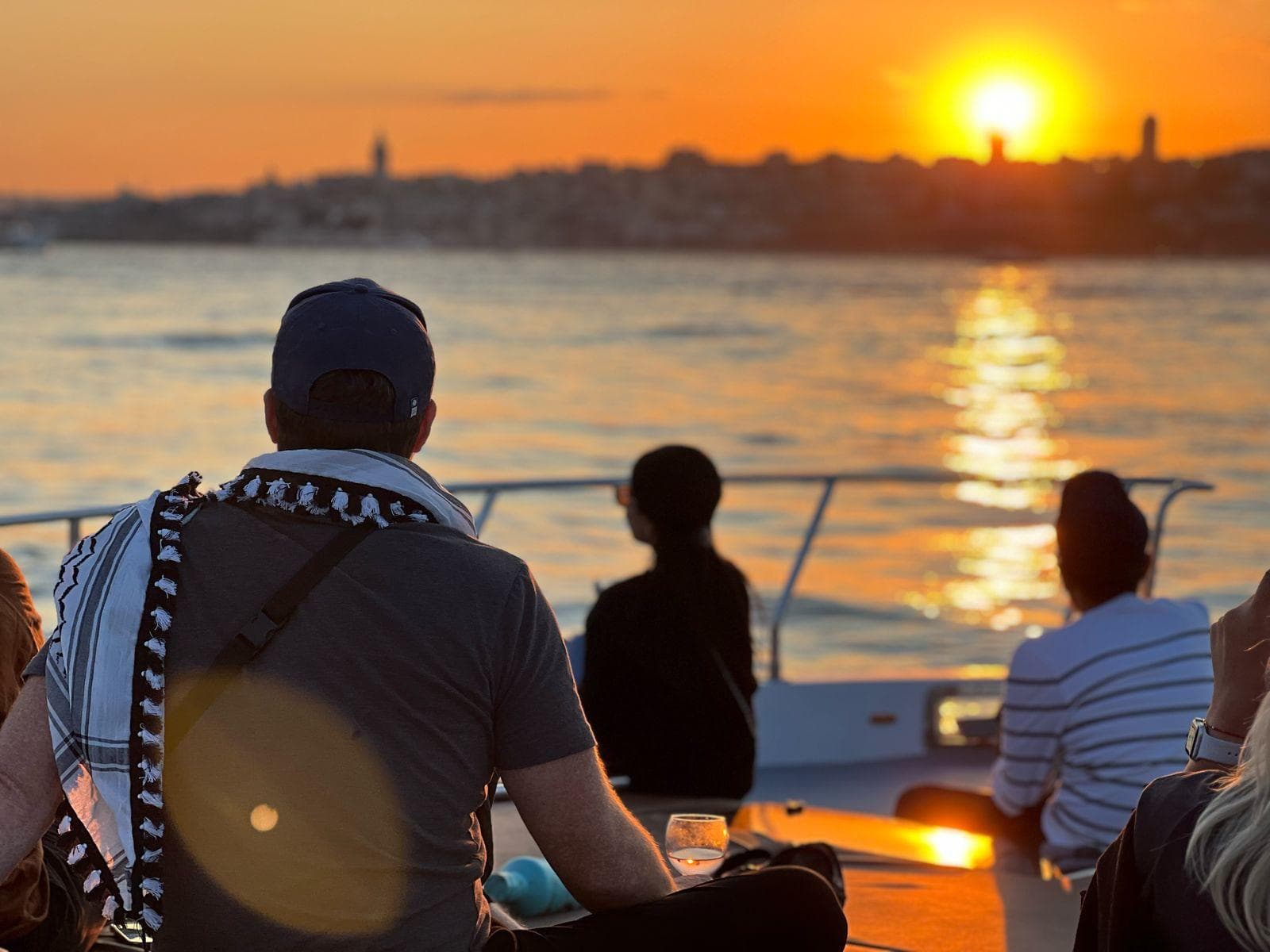Golden-hour sunset over the Bosphorus from a private yacht